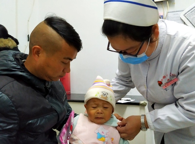 宜都妇幼保健院：患儿就诊现高峰 党员带头“打硬仗”IMG_20190104_105217.jpg